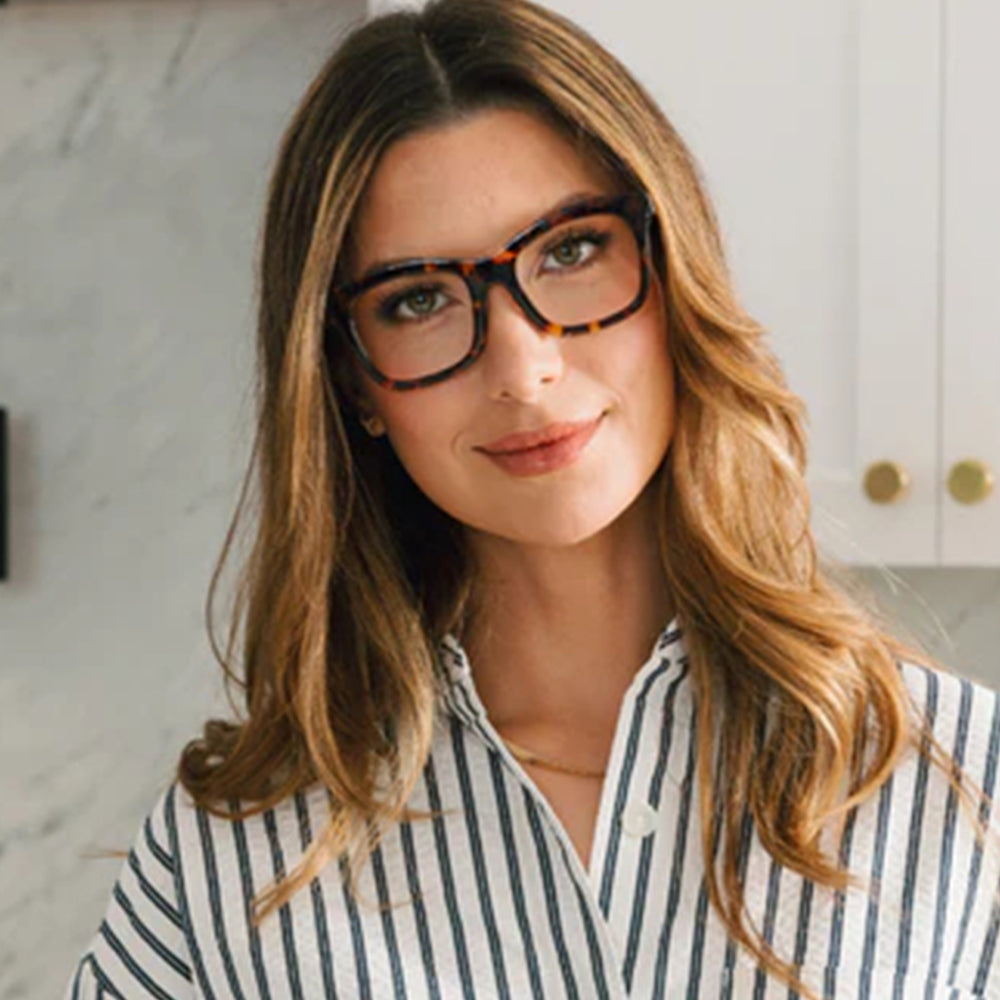 Tortoiseshell cat-eye glasses on a woman