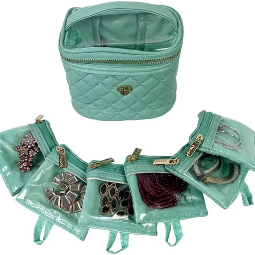 Turquoise jewelry organizer with jewelry items on a white background