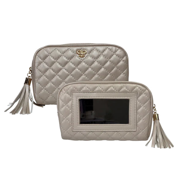 Two beige quilted bags with tassels on a white background