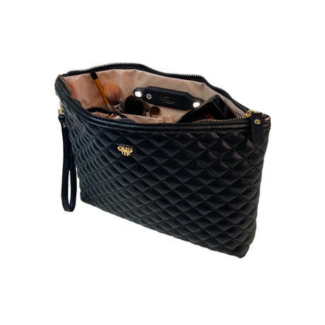 Black quilted handbag with gold logo on a white background