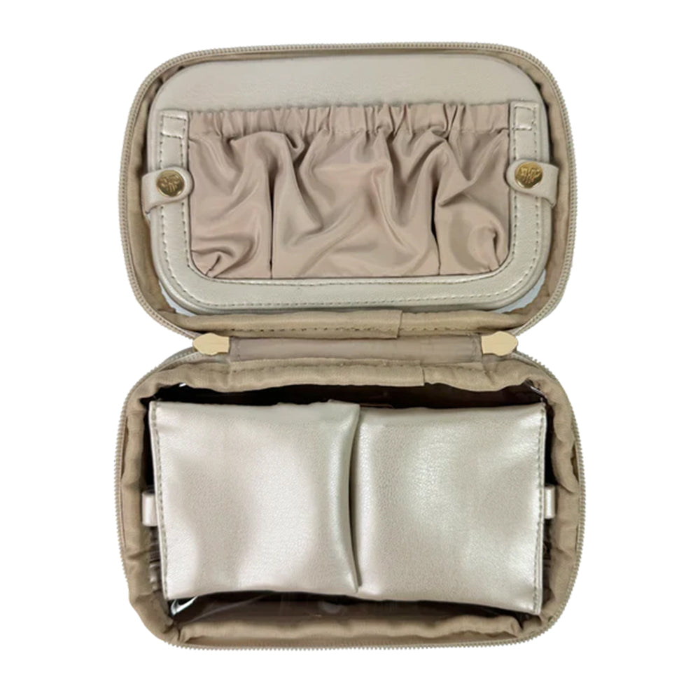 Open beige jewelry case with silver jewelry inside on a white background