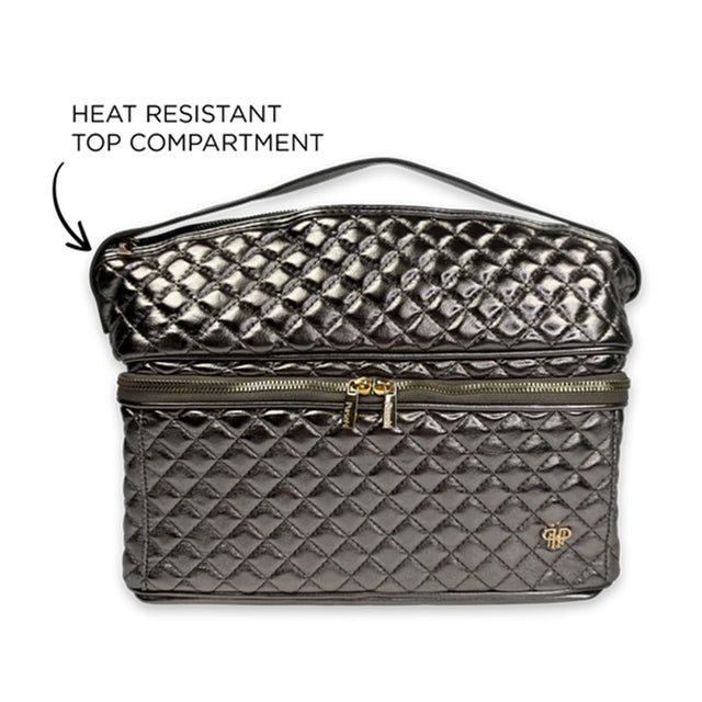 Quilted makeup bag with heat resistant top compartment feature on a white background