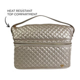 Quilted beige handbag with a heat resistant top compartment feature on a white background