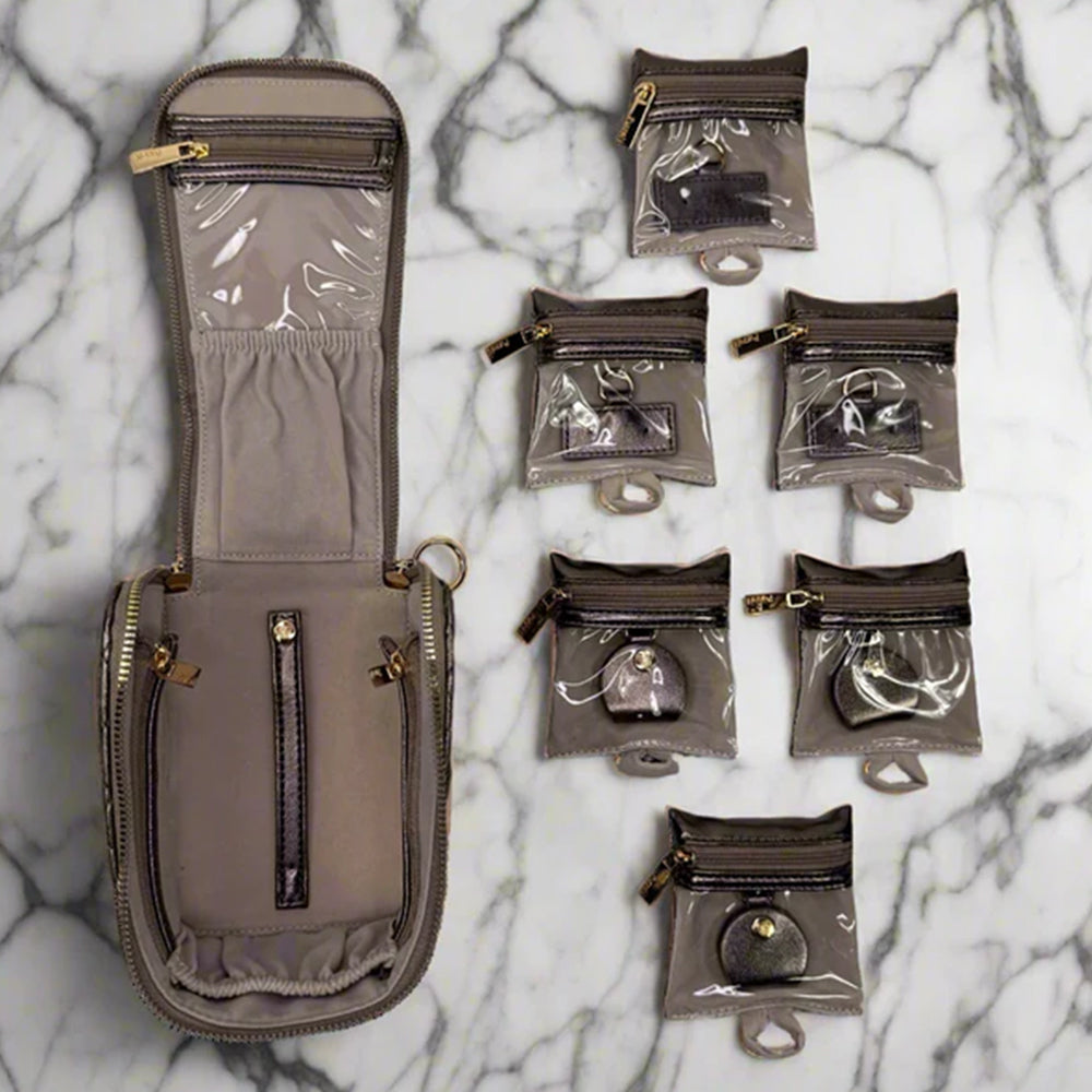 Set of small bags and pouches on a marble surface