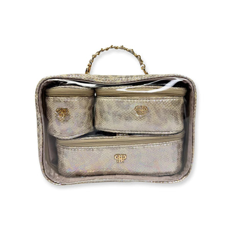 Gold travel case with a handle on a white background