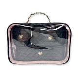 Clear travel bag with pink trim and gold logo on a white background