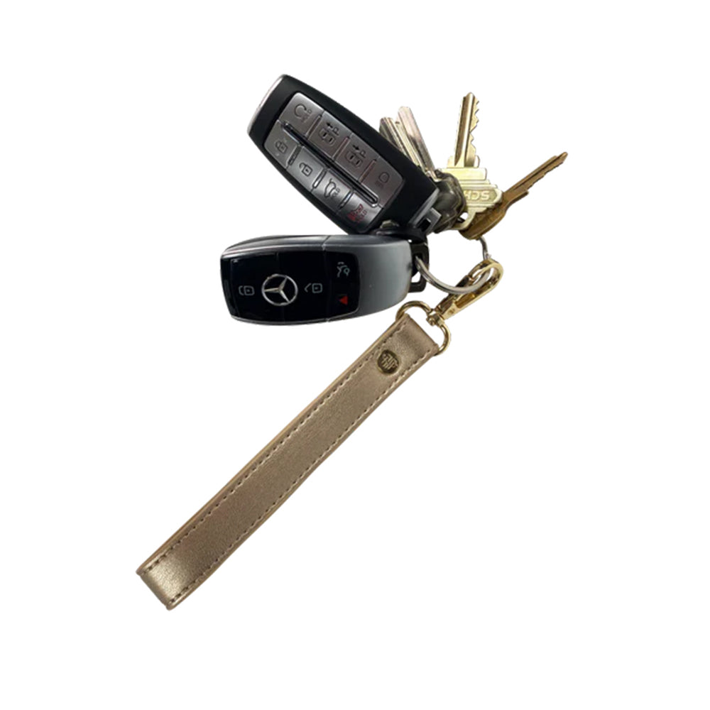 PurseN Wristlet Strap Gold Dust with keys on white background