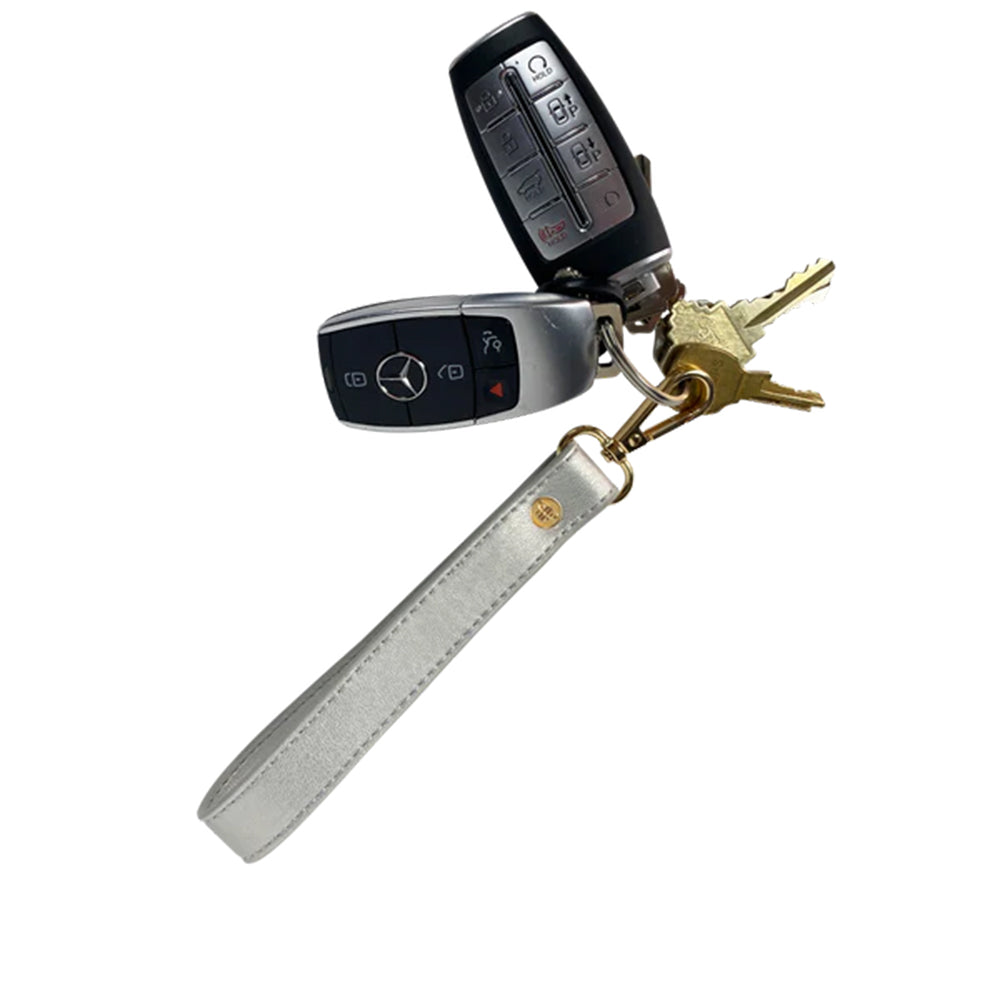 PurseN Wristlet Strap Platinum with keys on white background