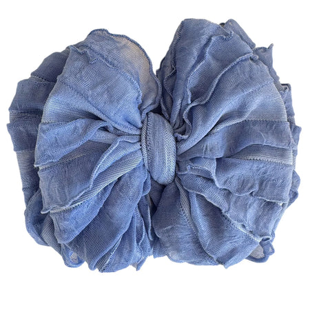 Blue fabric scrunchie on a white background