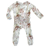 Floral baby onesie on a white background