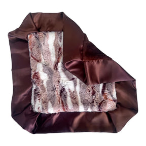 Brown satin bag with fur lining on a white background