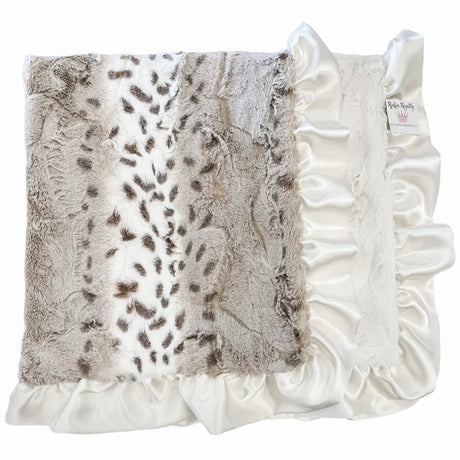 Decorative pillow with faux fur and ruffle trim on a white background