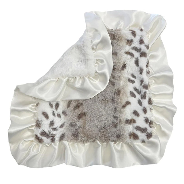 Blanket with leopard print pattern and white ruffled edges on a white background