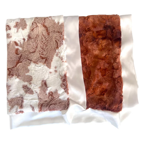 Textured fabric swatches in brown, white, and red on a white background