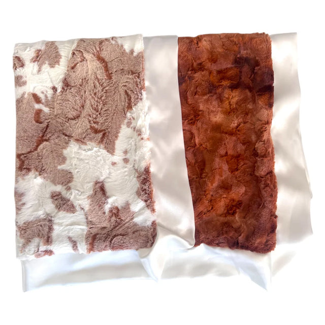 Textured fabric swatches in brown, white, and red on a white background