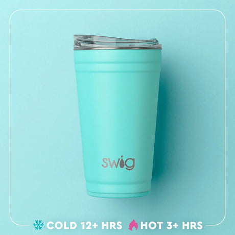 A mint green insulated travel tumbler with a clear lid, featuring the 'swig' brand logo on the front, set against a matching light blue background with promotional text at the bottom.