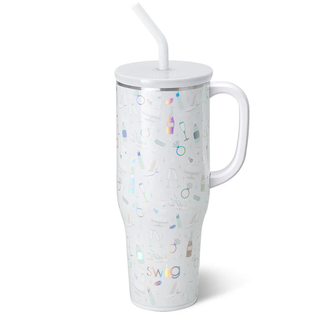 White tumbler with colorful designs and a straw on a white background