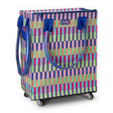 Colorful patterned shopping cart with blue handles on a white background