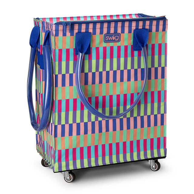 Colorful patterned shopping cart with blue handles on a white background