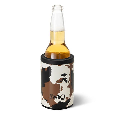 Glass bottle with a cow print swig koozie on a white background
