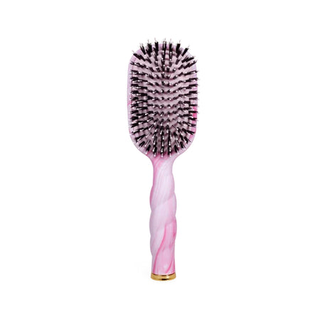 Hairbrush with pink handle and black bristles on a white background