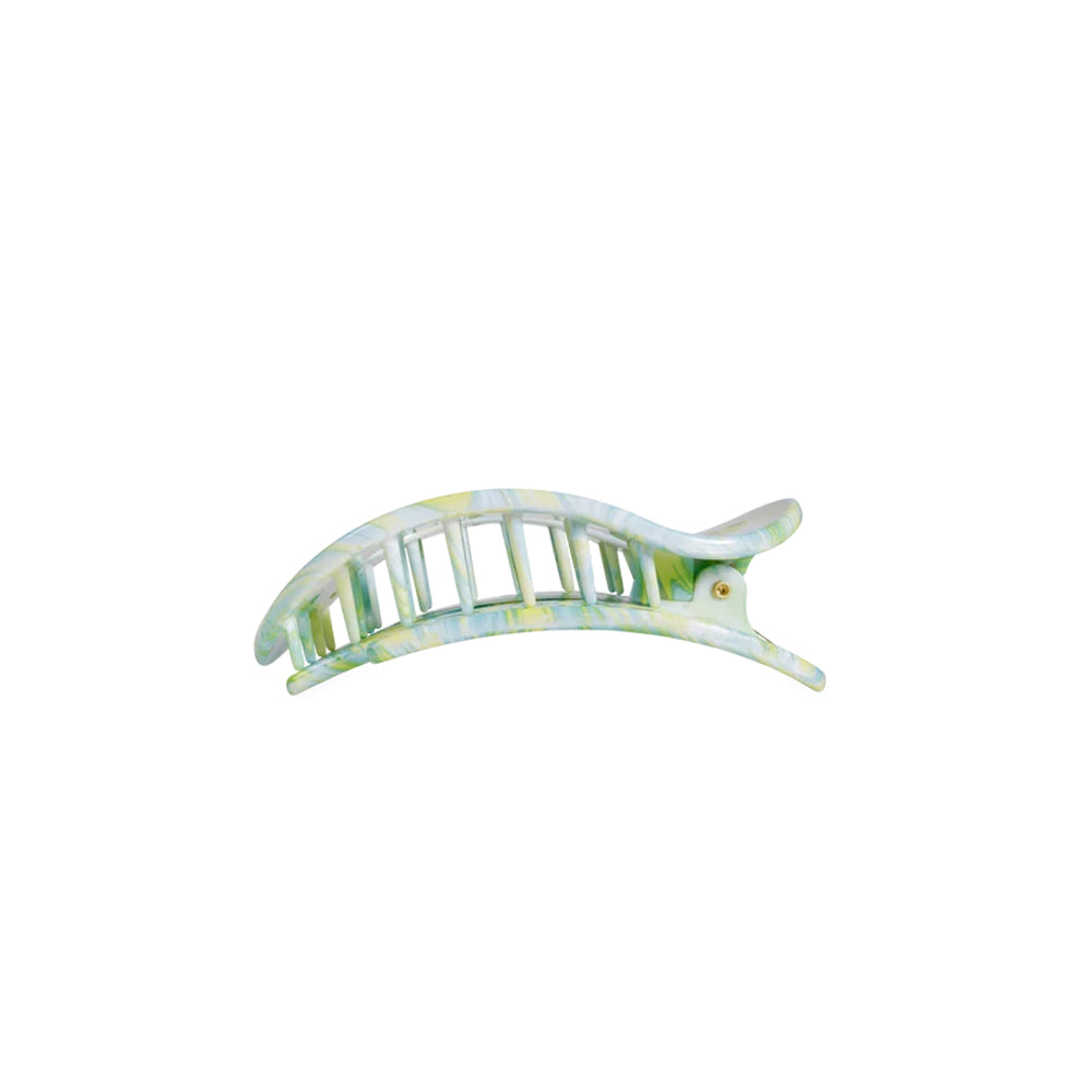 A curved hair claw clip with a marbled pattern of light green, yellow, and white, shown against a plain white background.