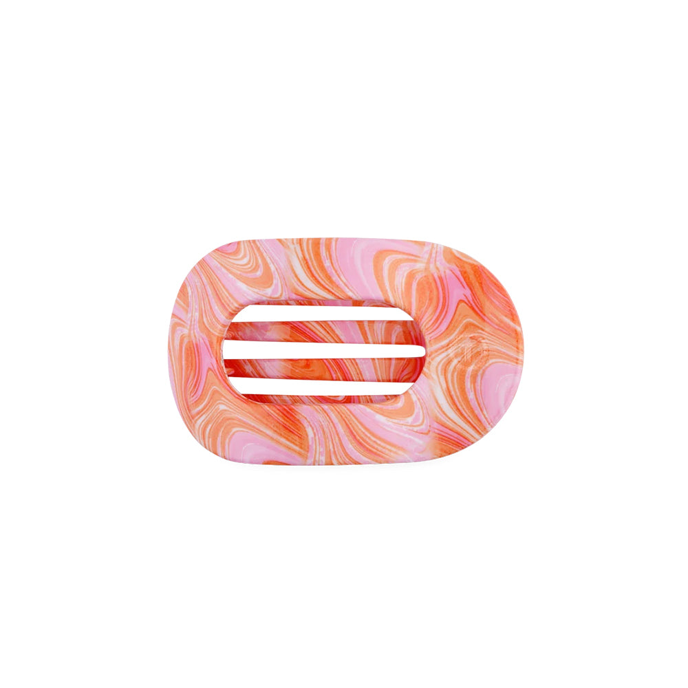 Pink hair clip on a white background