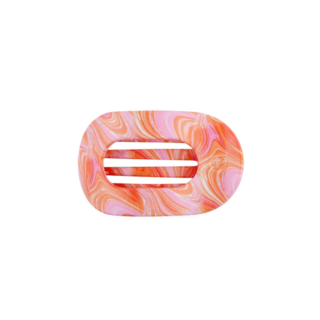 Pink hair clip on a white background