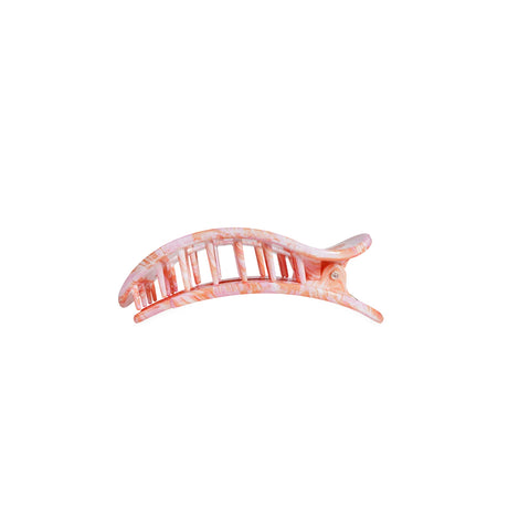 Pink hair clip on a white background