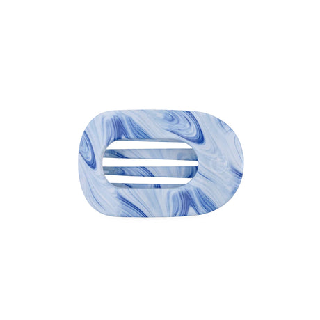 A blue and white marbled resin hair clip with a horizontal center slot, shown on a plain white background.