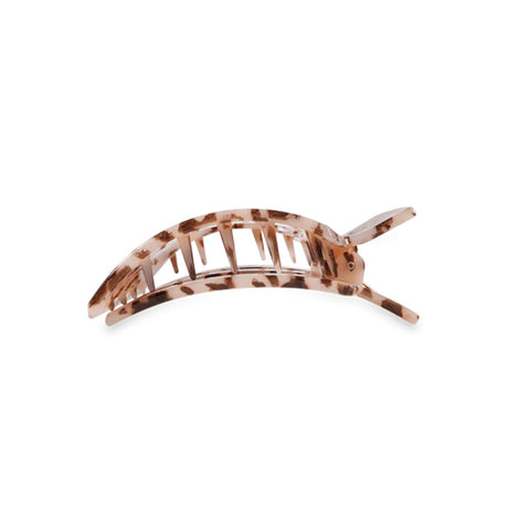 Tortoiseshell patterned hair clip on a white background