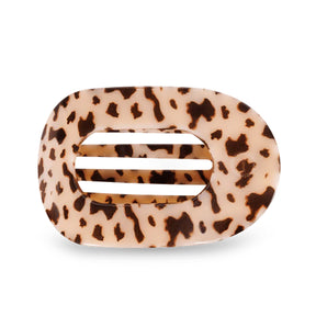 Leopard print hair clip on a white background