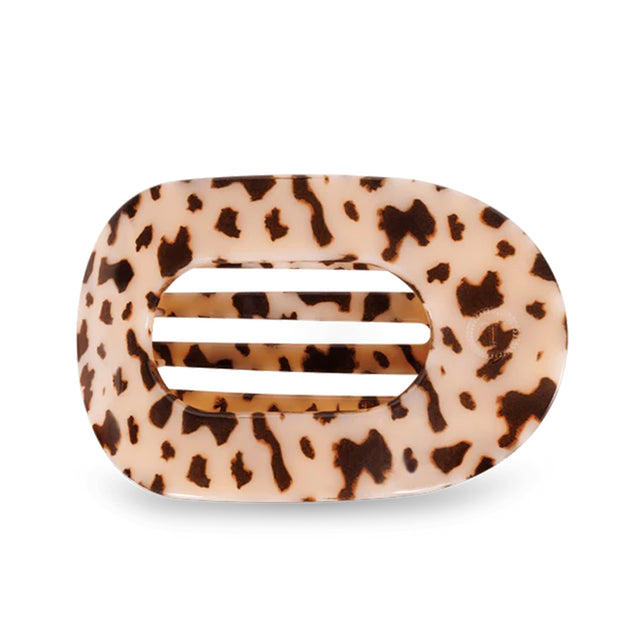 Leopard print hair clip on a white background