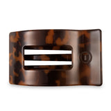 Tortoiseshell hair clip on a white background