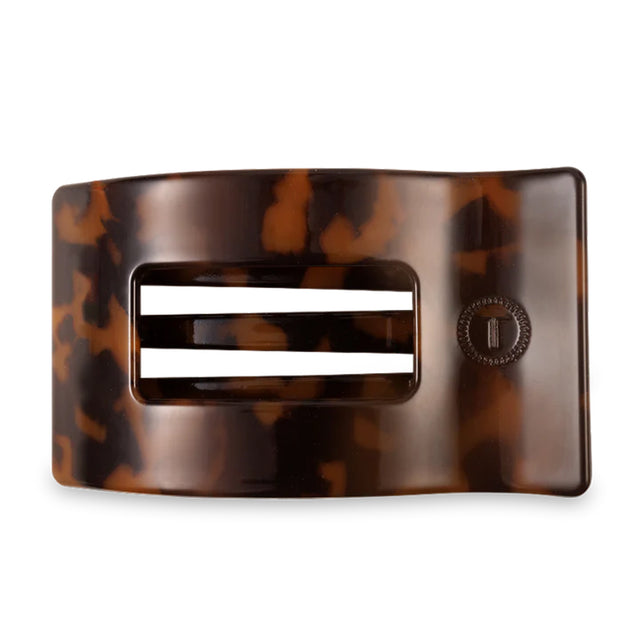 Tortoiseshell hair clip on a white background
