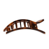 Tortoiseshell hair clip on a white background