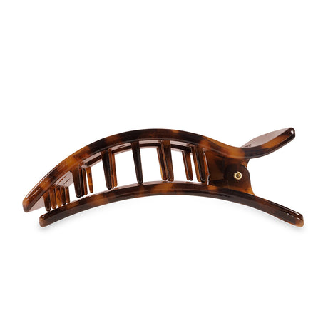 Tortoiseshell hair clip on a white background
