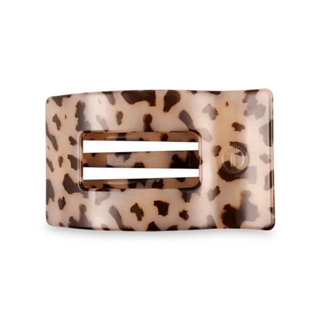 Tortoiseshell patterned hair clip on a white background
