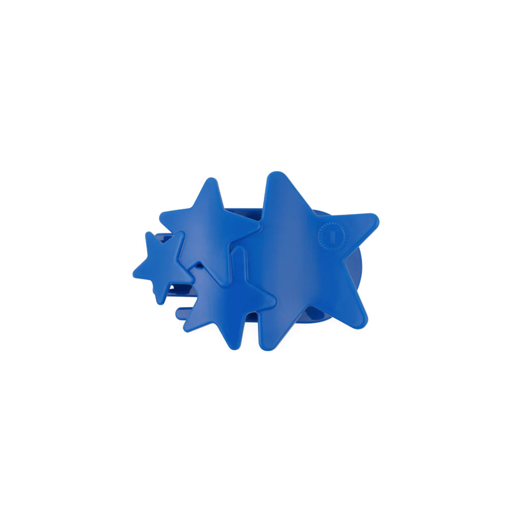 Blue star-shaped hair clip on a white background