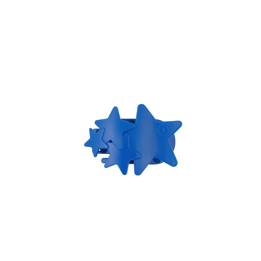 Blue star-shaped flat hair clip on a white background