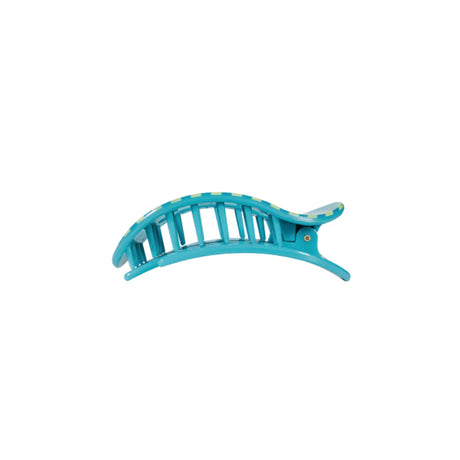 Turquoise hair clip on a white background