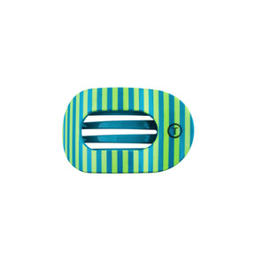 Striped oval hair clip with a central white stripe on a white background