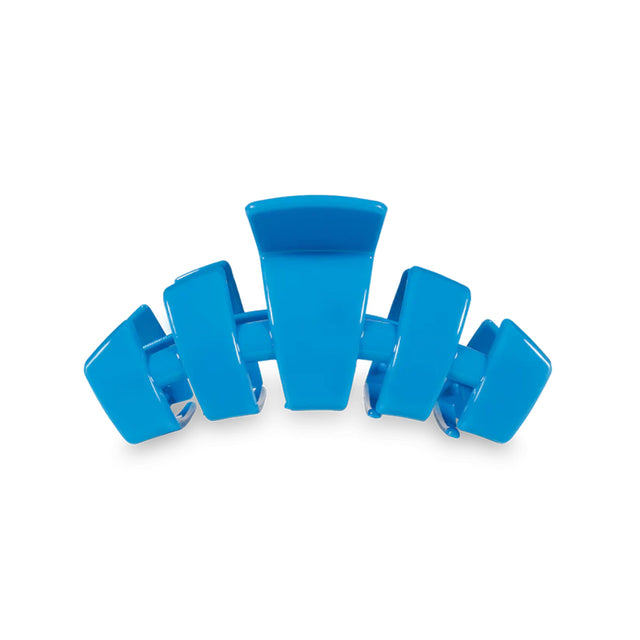 Blue hair clip on a white background
