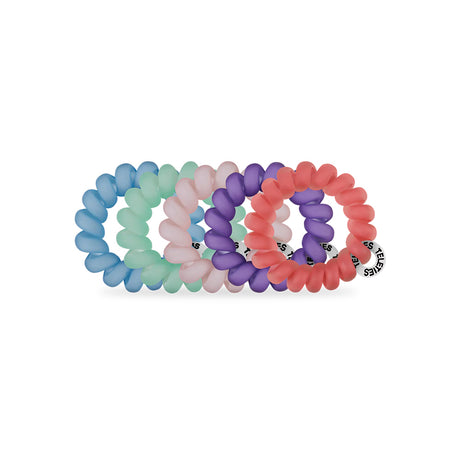 Set of colorful hair ties on a white background