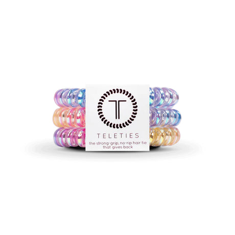 Set of colorful hair ties with a Teleties branded label on a white background