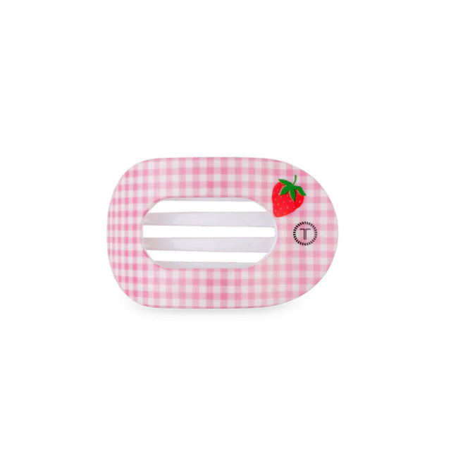 Pink gingham hair clip with a strawberry design on a white background