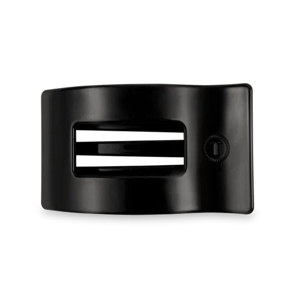 Black hair clip on a white background