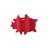 Red star-shaped hair clip on a white background