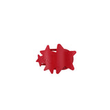 Red flat plastic hair clip on a white background