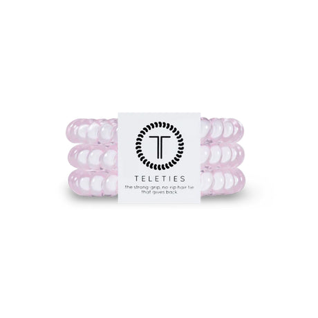 Pink hair ties with a Teleties label on a white background